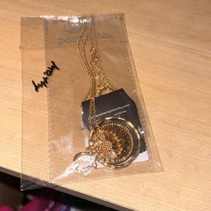 Woman’s gold necklace